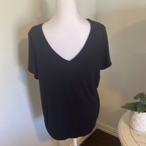 Cabi soft solid black tee shirt from extra large.  Newer season.
